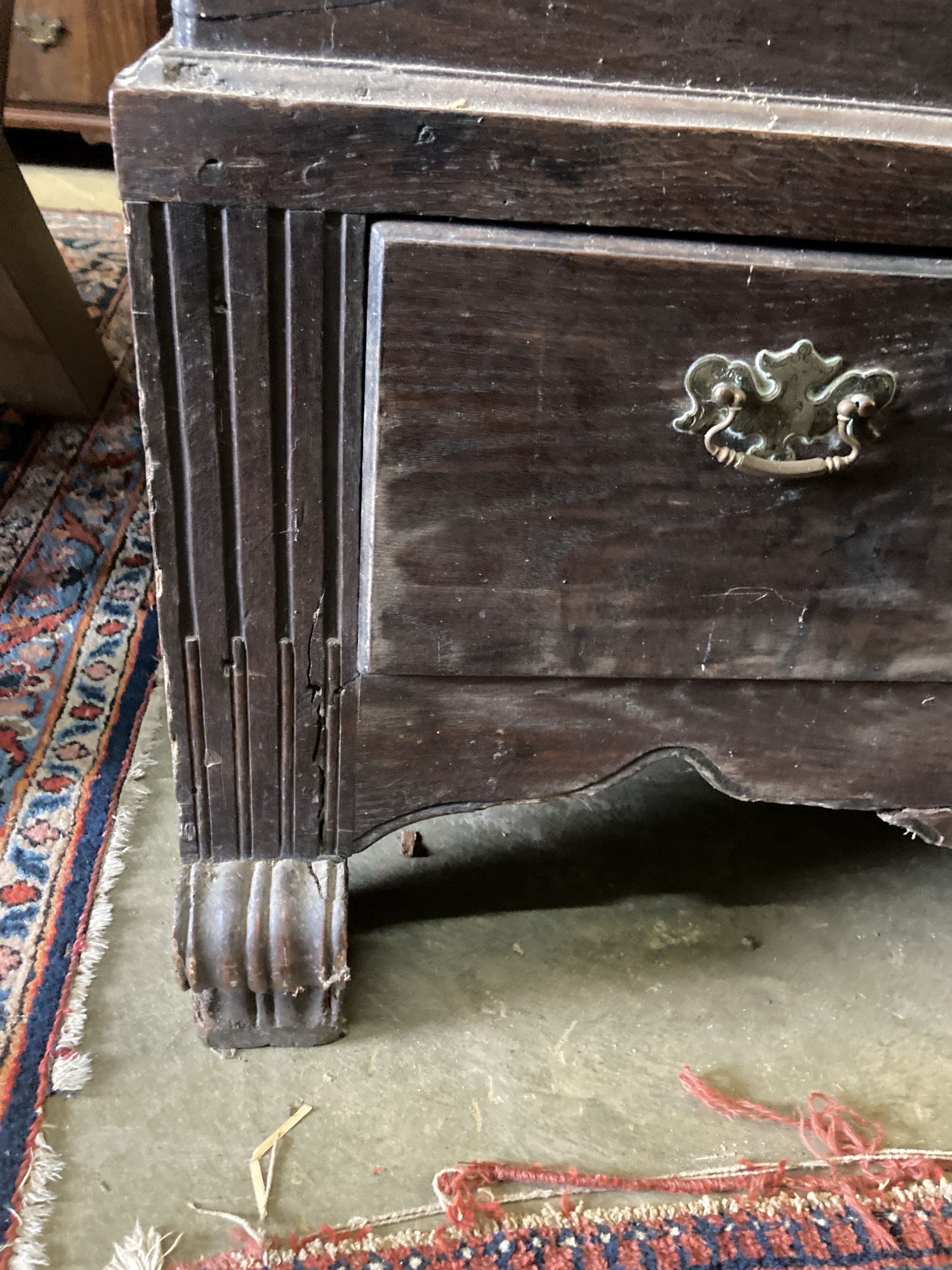 An 18th century oak mule chest, width 140cm, depth 56cm, height 110cm